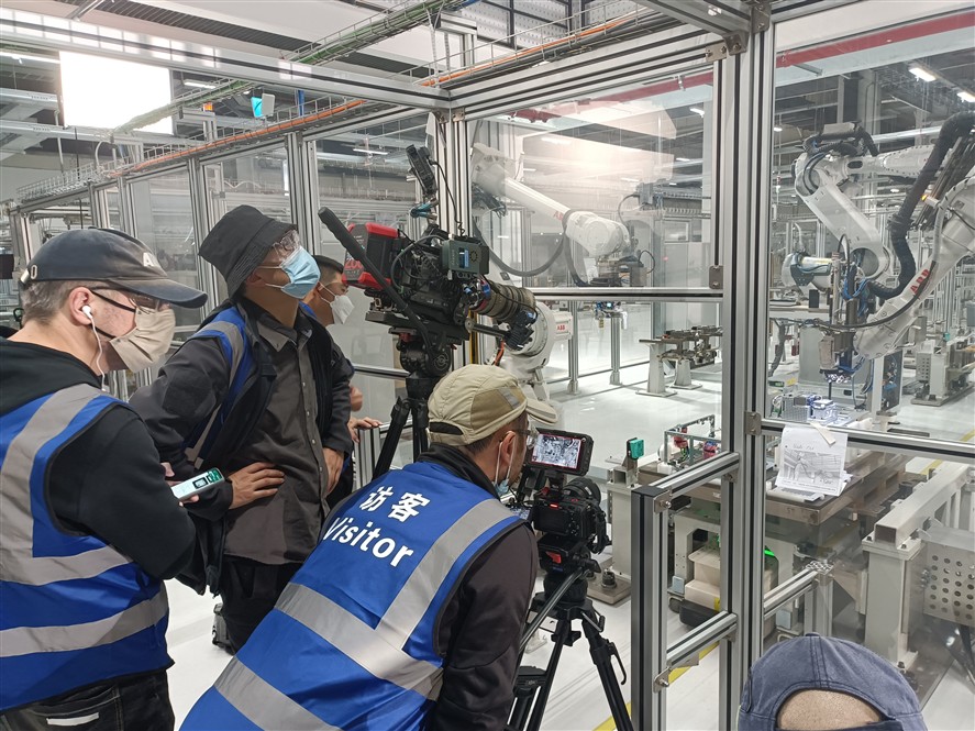 Nanjing production crew coordinating a local shoot